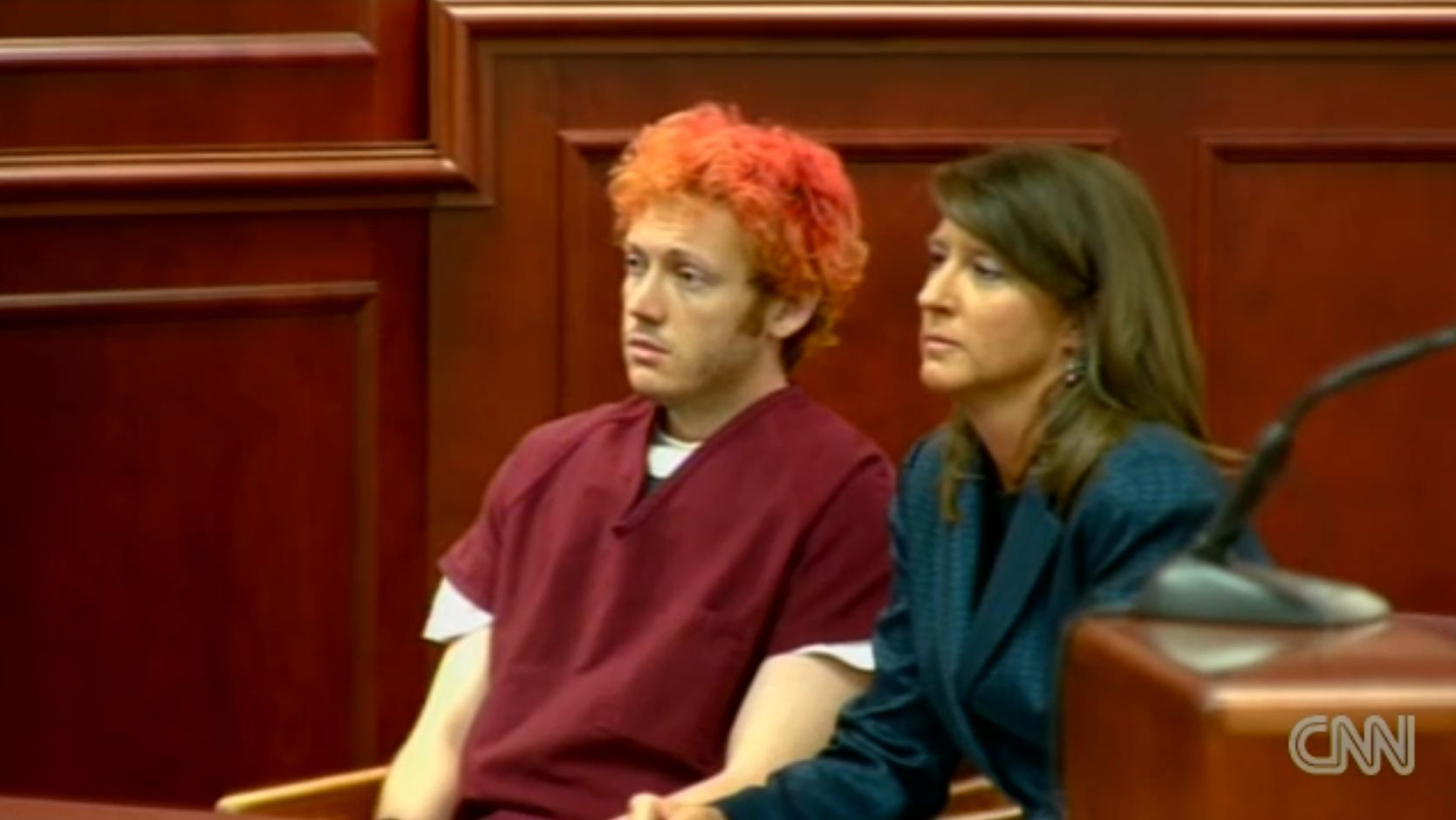 Prima aparitie a lui James Holmes in fata instantei. Procurorii cer pedeapsa cu moartea. VIDEO