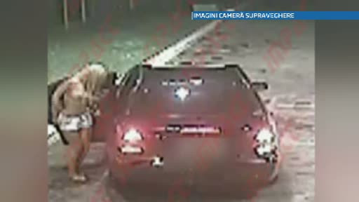 Reprezentatie inedita intr-o benzinarie din Targu Jiu. O blonda a dansat lasciv in sanii goi