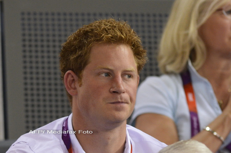 Printul Harry trebuie sa-i dea explicatii reginei pentru pozele in care este complet dezbracat