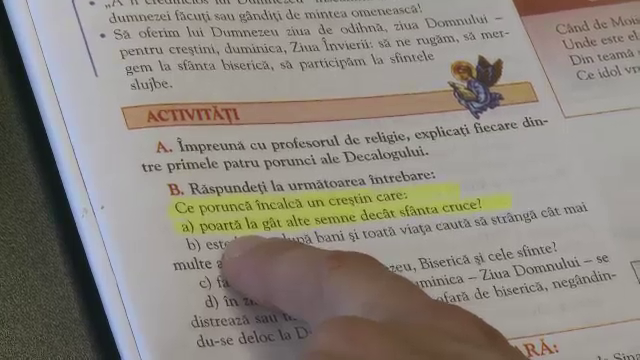 Elevii din clasa zero, amenintati ca vor "arde in iad" in manualele de religie