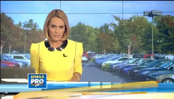 Masina lovita de un glont militar, in parcarea unui supermaket din Militari, aflat langa un poligon