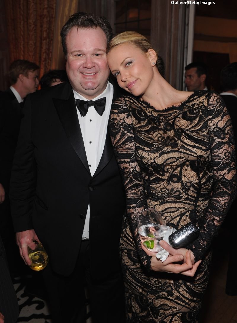 Charlize Theron si Eric Stonestreet