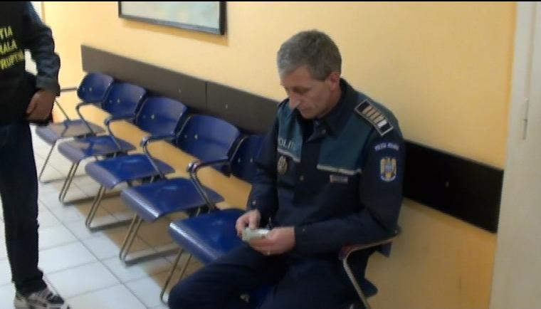 Politist retinut pentru trafic de influenta. Ce i-a promis unui sofer pentru 150 euro