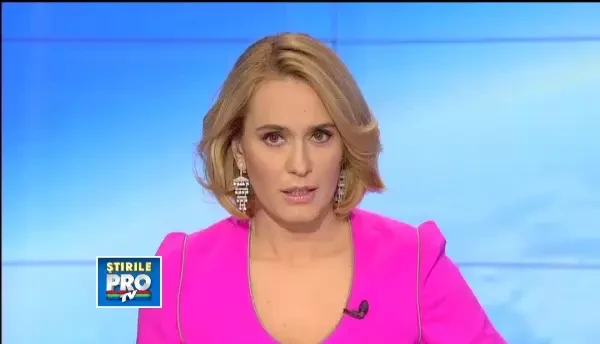 Doi ani de inchisoare, cu executare, pentru soferul care a luat pe capota masinii un politist