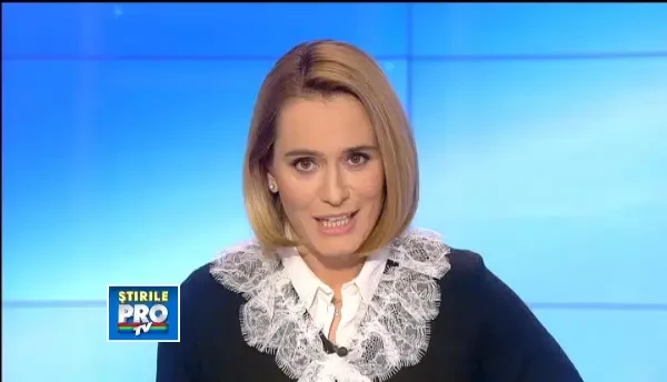 Michelle Obama le-a citit povesti unor copii bolnavi.Cainele prezidential a stat cuminte in poala ei