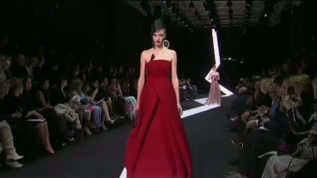 Trei romani au furat imbracaminte Armani de 2 milioane euro, dintr-un depozit din Verona