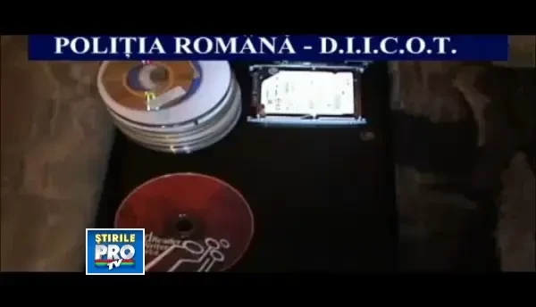 Perchezitii la Oradea si Iasi. Vizati sunt membrii unei grupari specializate in fraude informatice