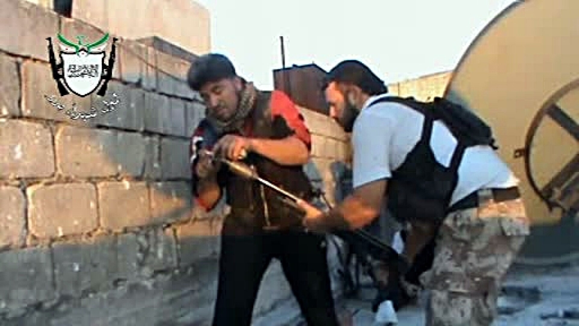 Inregistrarea VIDEO a unei zile de razboi in Siria. Batalia pentru un cartier din orasul Homs