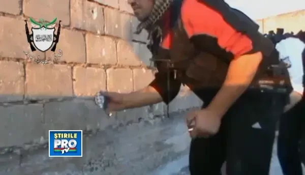 CLIPUL ZILEI: Inregistrarea VIDEO a unei zile de razboi in Siria. Batalia pentru un cartier din orasul Homs