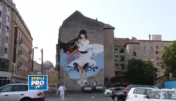 Cel mai mare graffiti realizat pe o cladire istorica din Romania se afla la Timisoara. VIDEO