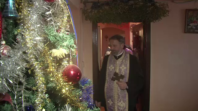 Preotii din judetul Alba au pornit deja cu botezul Domnului