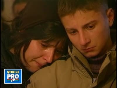 Mama Larisei Chelaru si fiul ei, Cosmin