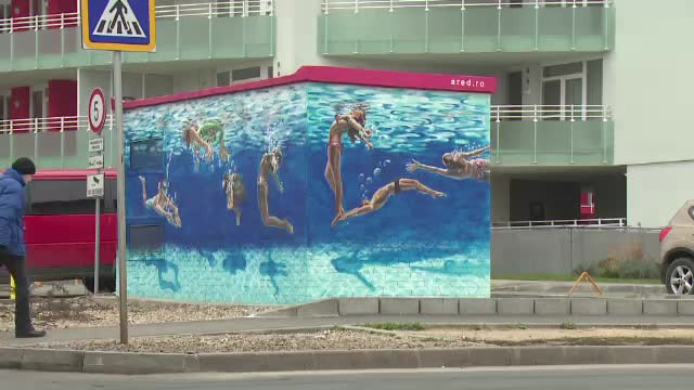 Aradul se transforma dintr-un oras gri intr-unul plin de culoare si farmec. Un profesor de desen da viata zidurilor murdare