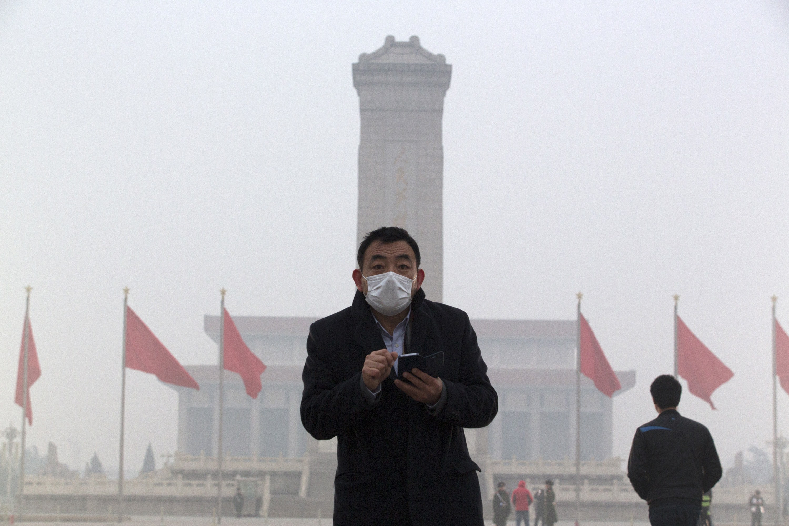 Beijingul, in premiera, sub cod portocaliu de smog. Poluarea de 15 ori mai mare decat maxima admisa