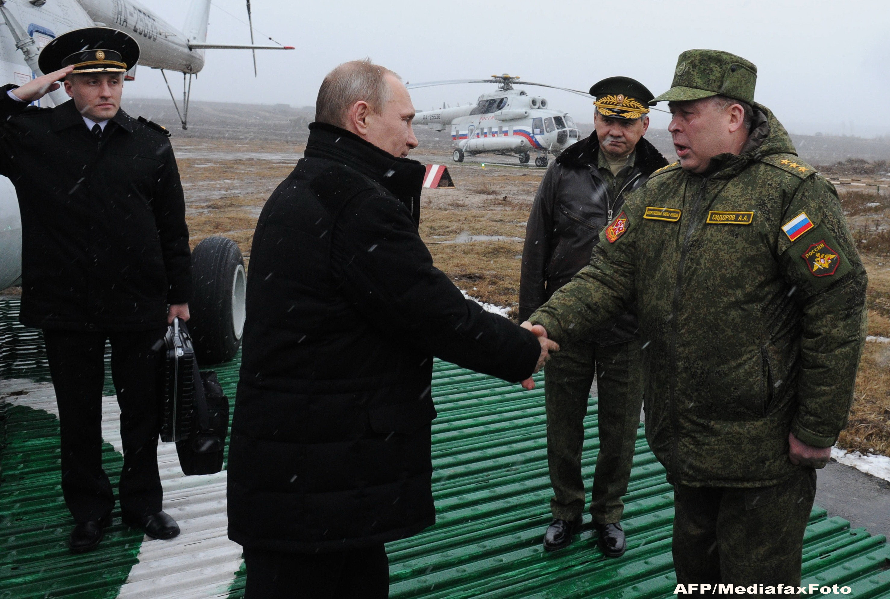 Criza in Ucraina. Putin ii cere lui Porosenko sa negocieze cu insurgentii. "Planul lui sa nu aiba un caracter de ultimatum"