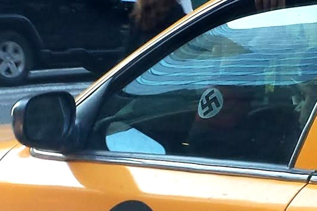 Banderola nazista l-a facut sa isi piarda licenta. Povestea taximetristului din New York care a revoltat locuitorii orasului