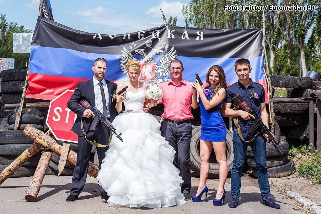 Si-au facut o fotografie de nunta in mijlocul conflictului din Ucraina. Ce comentarii au primit