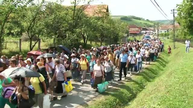 Motivul pentru romanii plecati peste hotare il descopera acolo pe Dumnezeu. Ce spune staretul unei manastiri