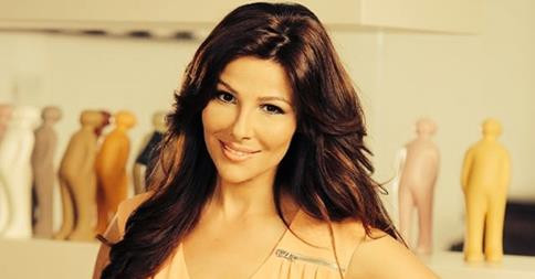 Oana Cuzino divorteaza de sotul ei, dupa 12 ani de casnicie. "Vom fi in continuare prieteni si parintii copilului nostru"