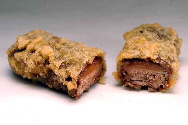 Cercetatori: Batonul de ciocolata Mars, prajit, consumat in Scotia, poate provoca un atac cerebral
