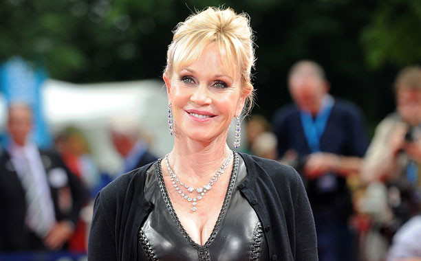 Fotografia este cat se poate de reala: Melanie Griffith a locuit impreuna cu parintii ei si un leu fioros! FOTO