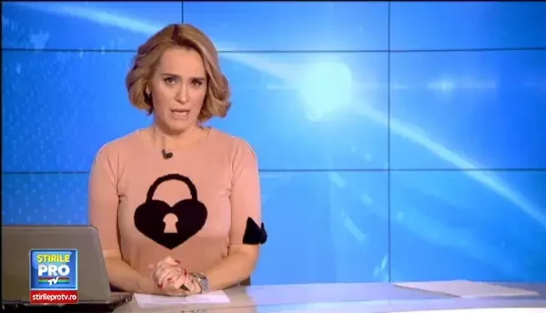 Tanara batuta de un barbat in timpul unei emisiuni transmise LIVE in Rusia. VIDEO