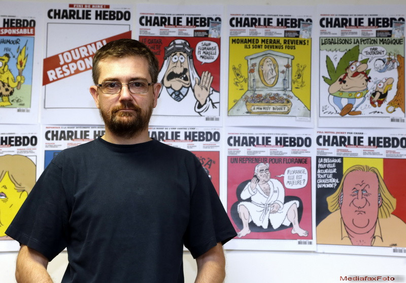 Executia caricaturistilor de la Charlie Hebdo. Au intrat in sedinta de redactie, i-au strigat pe nume si i-au impuscat in cap