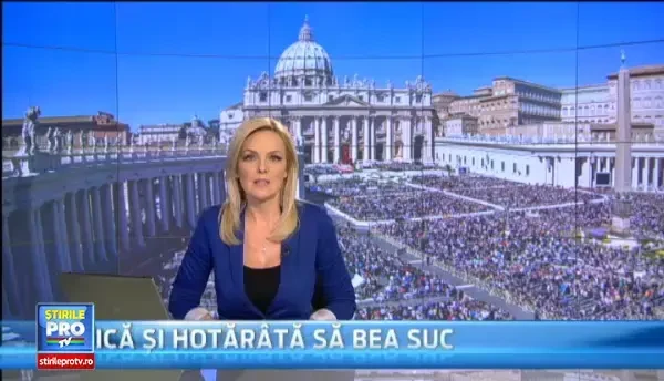 Mii de credinciosi catolici au participat la procesiunea de Florii din Capitala, in ciuda vremii mohorate