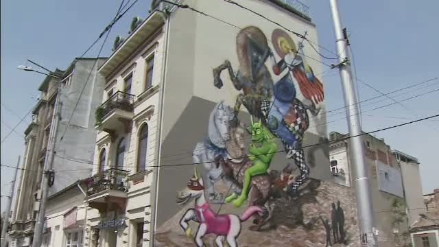 Graffitiul cu Sfantul Gheorghe, din Capitala, a fost acoperit cu var. "La noi nu se intelege ce inseamna street art"