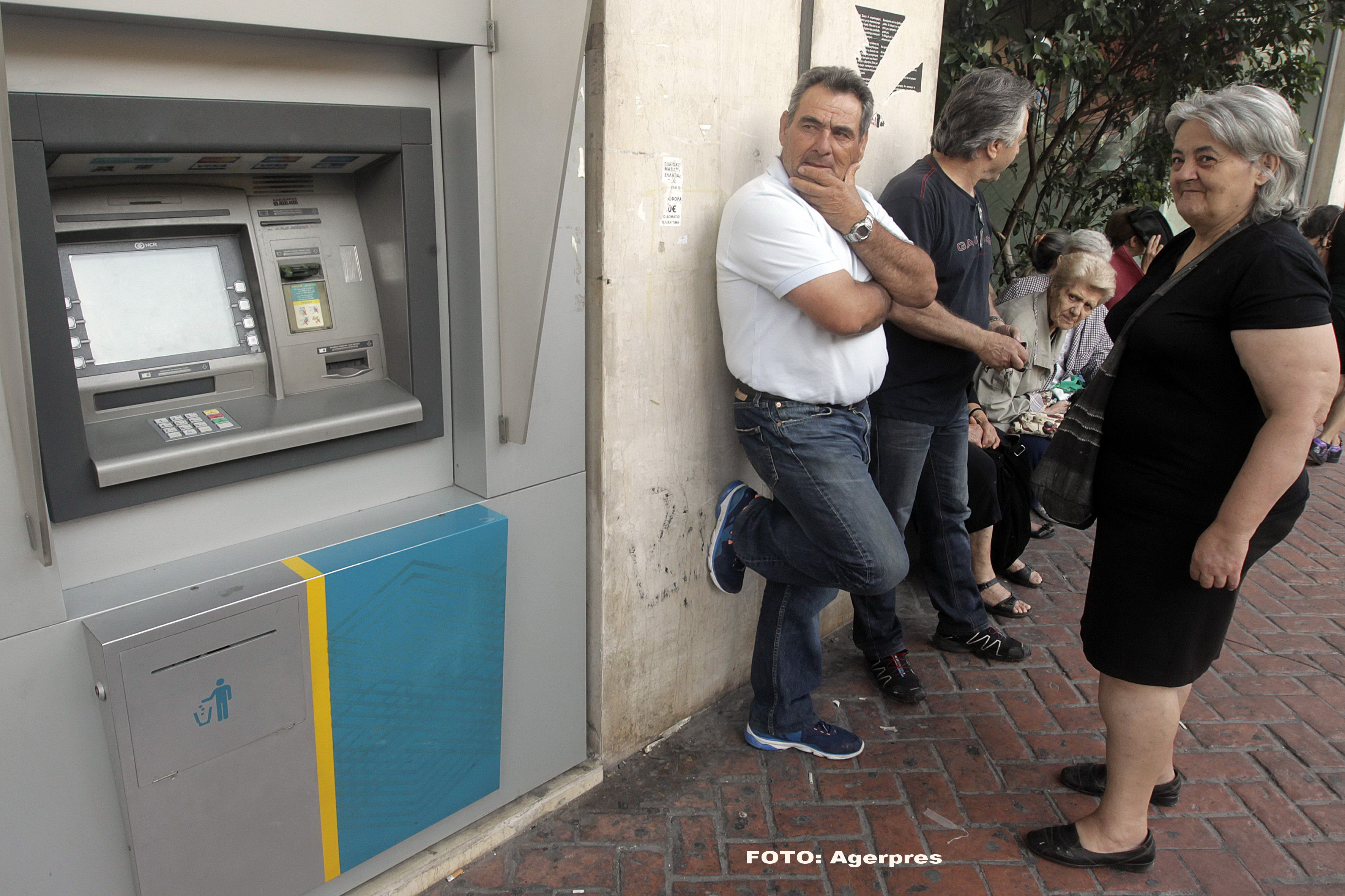 Ratingul deja dezastruos al Greciei a fost si mai rau coborat. Patru mari banci au fost plasate in "default partial"