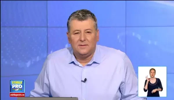 Focuri de tabara si gratare. Turistii de la munte n-au lasat ploaia si frigul sa le strice planurile. Ne incalzim cu tuica