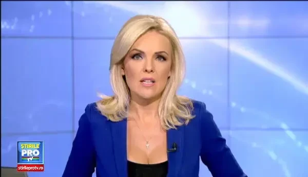 O mie de persoane au participat la ceremonia de inmormantare a politistului Gheorghe Ionescu. Sotia, vegheata de medici