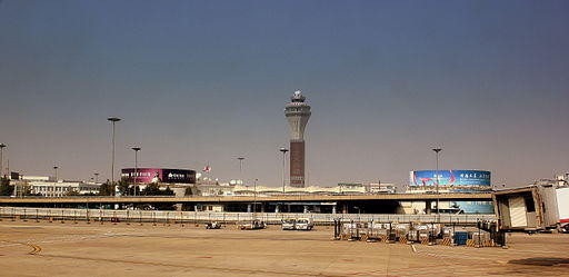 O pasagera a baut o sticla de cognac in Aeroportul din Beijing pentru ca nu a fost lasata sa o poarte in bagajul de mana