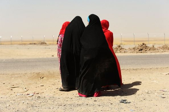 Tanara din Maroc, suspectata ca recruta femei sa lupte alaturi de ISIS, arestata si plimbata pe strazile din Spania