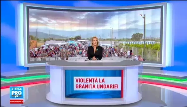 Cativa refugiati au reusit sa intre in Ungaria, dupa ce au fortat cordonul de politisti. 10 agenti au fost raniti. VIDEO