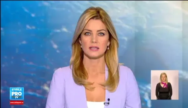 Credinciosii care se inchina la moastele Sfintei Parascheva indura frigul si ploaia. Printre ei, si bebelusi de 4 luni