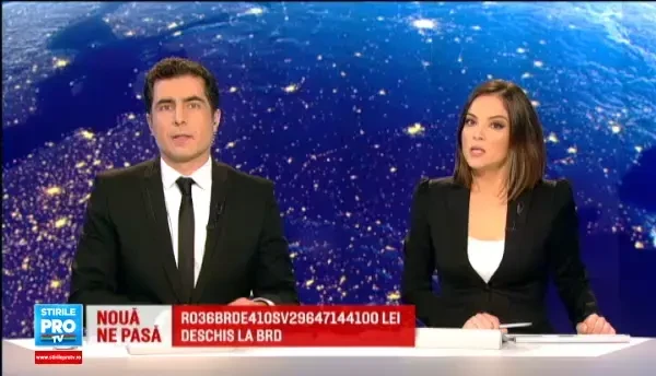 In fata clubului unde s-a petrecut nenorocirea se intinde acum o mare de lumanari si flori