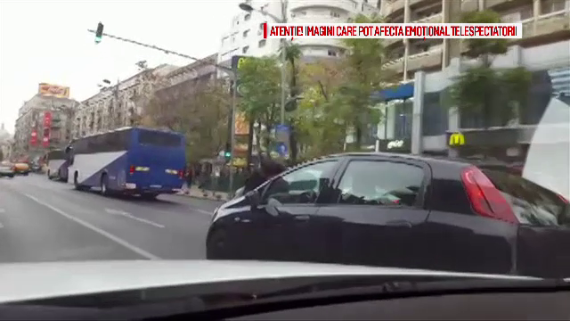 Imagini incredibile surprinse in trafic. O femeie a luat pe capota un barbat care o acuza ca l-ar fi tamponat cu intentie