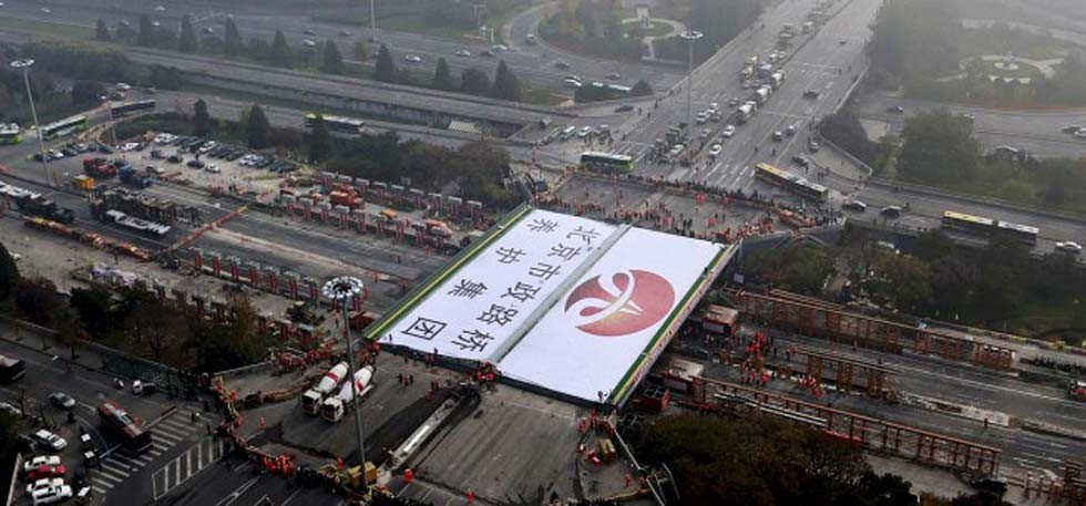 Dorele, ce-ai facut, ma? :) In cat timp reusesc chinezii sa darame si sa reconstruiasca un pod cu 4 benzi pe sens: VIDEO