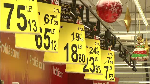 Ce si-au cumparat romanii care au dat navala in magazine dupa reducerea TVA. "Am luat si cate ceva ce nu ne trebuia neaparat"