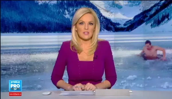 Zeci de mii de curajosi au sarbatorit Anul Nou in apele inghetate. Prima data simti ca mori, apoi este senzational