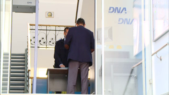 director anchetat de DNA