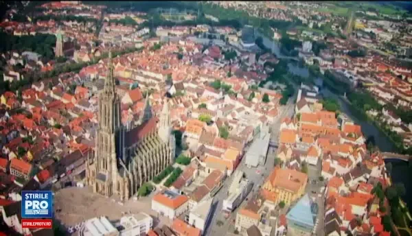 Orasul din Germania care si-a extins albia raului pana au aparut cafenelele, dar si mana intinsa a cersetorului roman