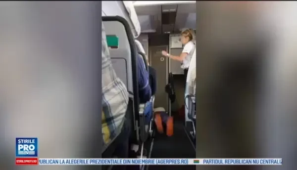 O americanca a inceput sa tipe si sa-si smulga hainele, in avion. Ce a urmat dupa ce a amintit de zborurile prabusite