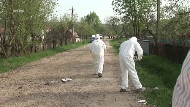 Cadavrul transat al unei femei data disparuta, descoperit in curte. Fiul ei a baut insecticid cand a fost chemat la Politie
