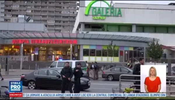 Cativa romani din Munchen au surprins scenele atacului armat: Erau cu armele in mana! Speriata, am fugit in padure