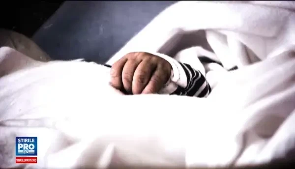 Si-a ucis copilul de 2 luni, pentru ca plangea. Inginerul din Galati a incercat sa scape aruncand vina asupra fiului de 1 an