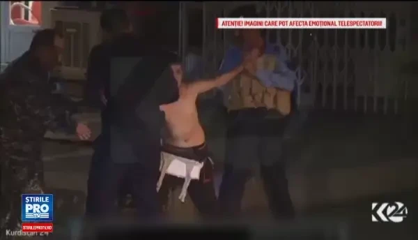 Momentul dramatic in care fortele irakiene opresc un copil kamikaze al ISIS inainte de a se arunca in aer in Kirkuk. VIDEO