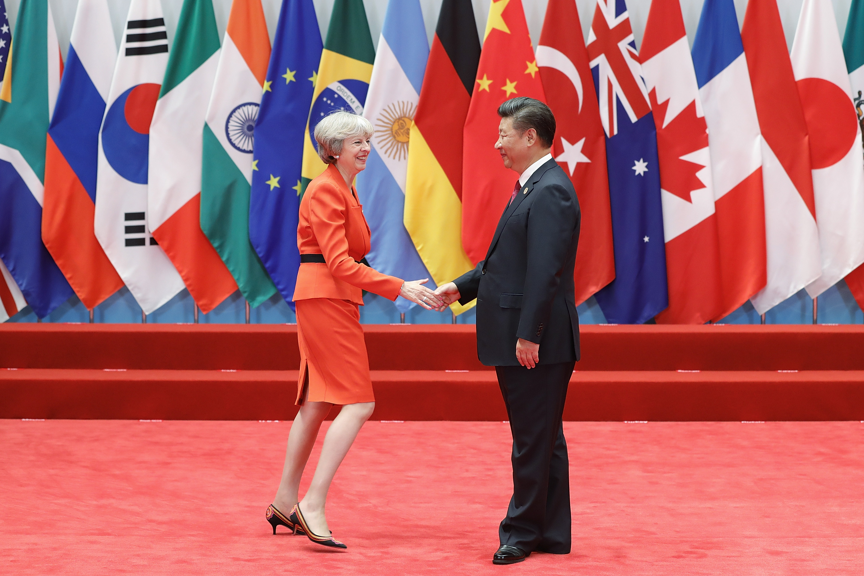 Ce au fost sfatuiti Theresa May si grupul G20, cu ocazia summit-ului: "Ni s-a spus sa ne schimbam sub cearsaf, la hotel"