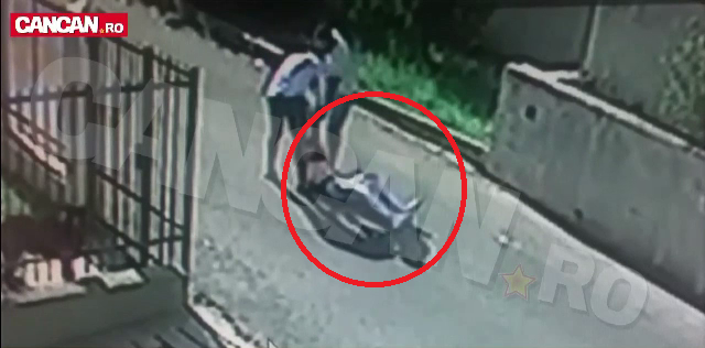 Cristi Boureanu, filmat in timp ce isi taraste fiica pe strada. Scenele surprinse inainte de interventia jandarmilor